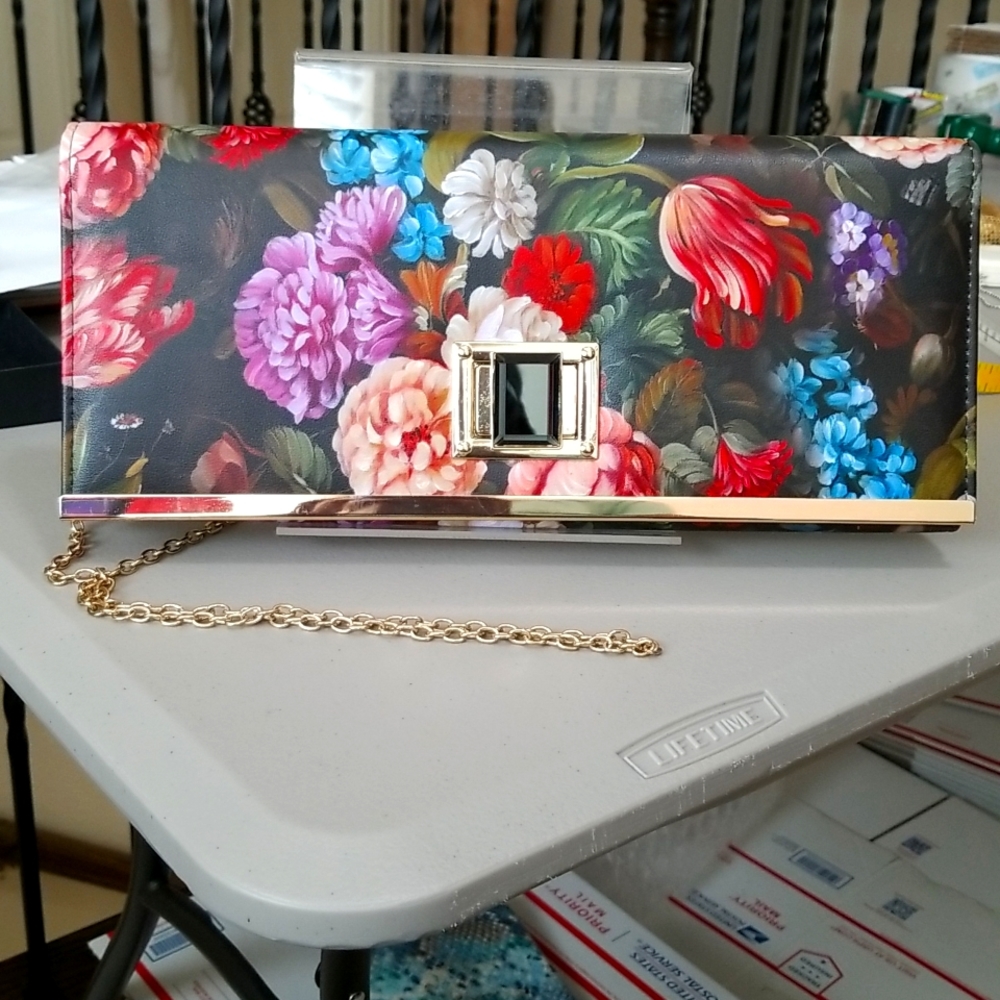 Beautiful floral clutch with gold chain strap